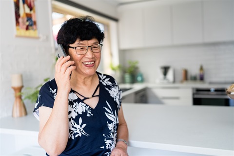 A client chats on the phone to an AccessCare team member.