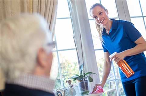 cleaner talking to older lady